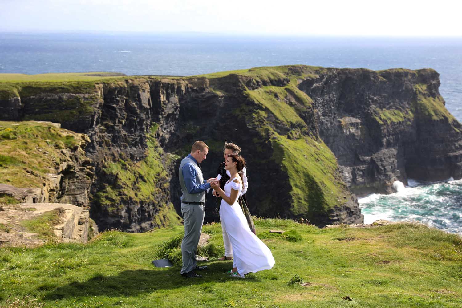 Couple being married at the Cliffs of Moher