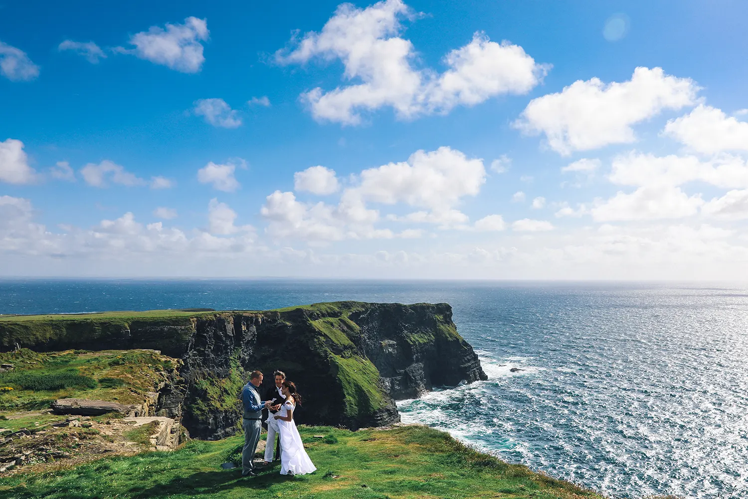 Couple during wedding ceremony on the Cliffs of Moher