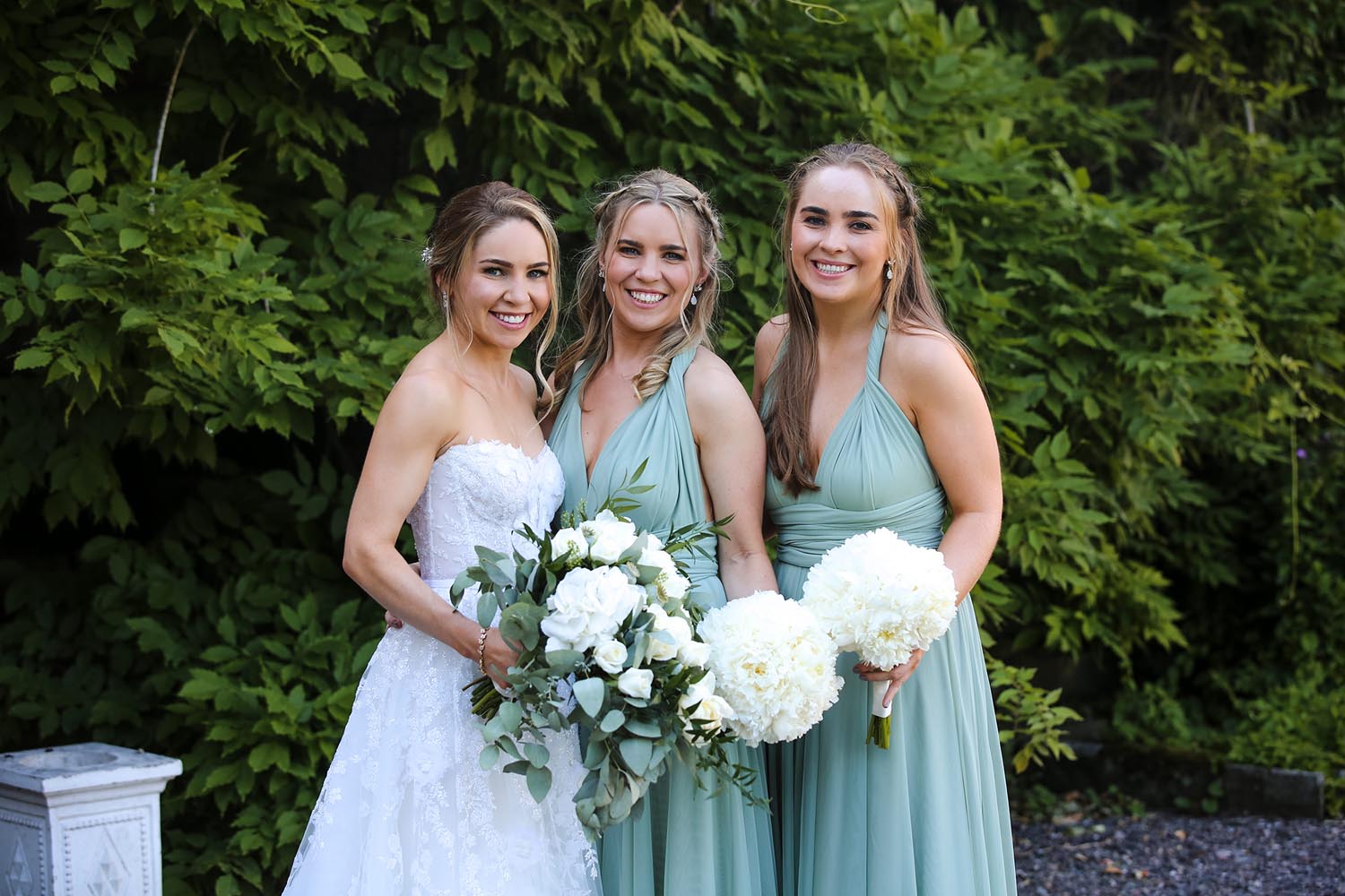 Bride with her and bridesmaids on her wedding day