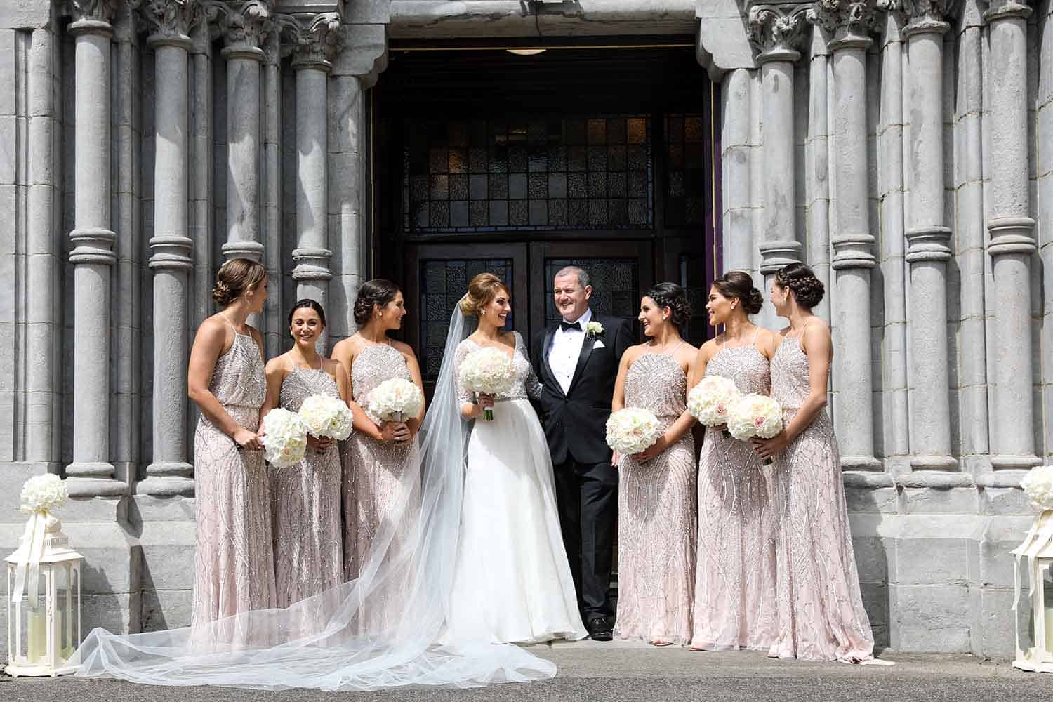 Bride and bridesmaids outside St Mary’s Church