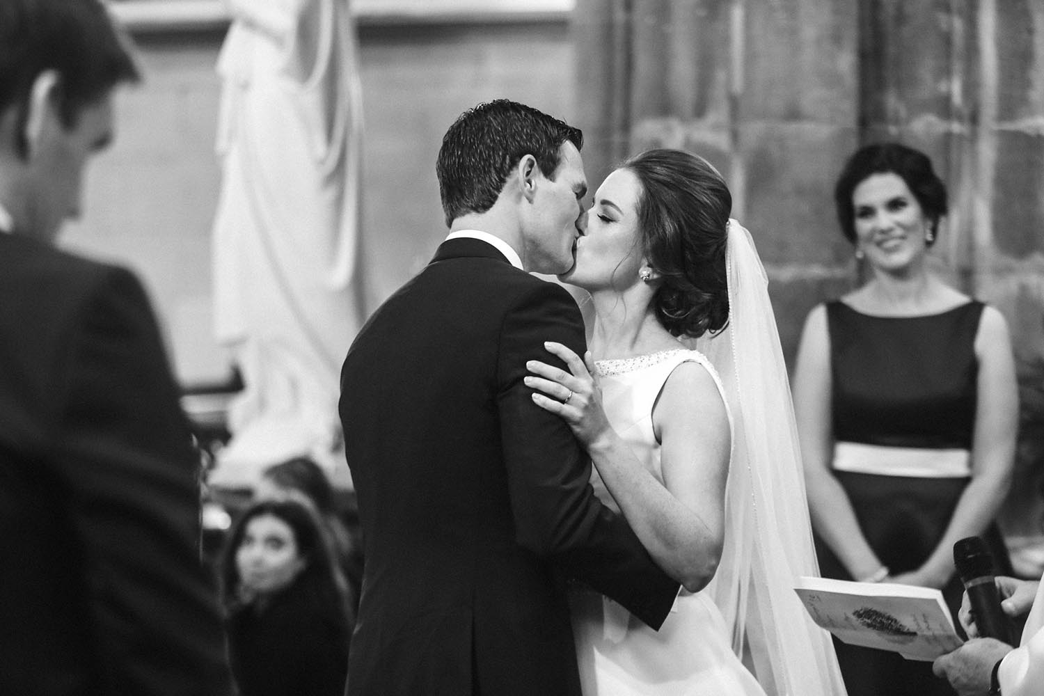 Bride and Groom kissing in the church