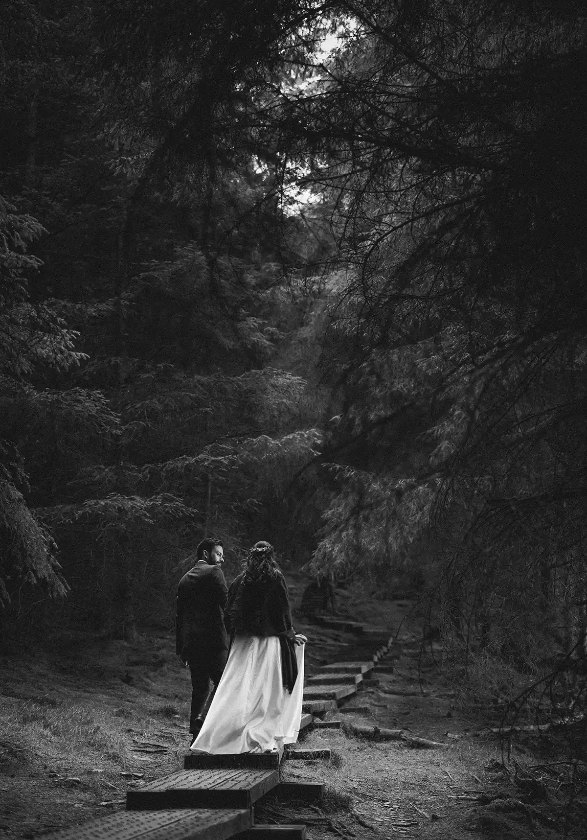 Married couple walking through a Co. Wicklow forest