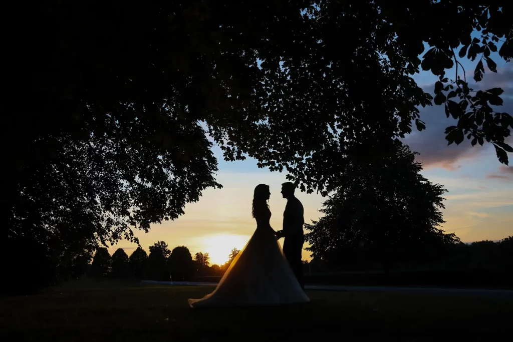 couple silhouetted sunset